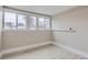 Bright bedroom with multiple windows and light colored floors at 3532 N Vine St, Denver, CO 80205