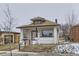 Charming front exterior of a two-story home with a front porch, steps, and a 'for sale' sign at 3532 N Vine St, Denver, CO 80205