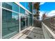 Modern condo building with sliding glass doors to a balcony, enhancing indoor/outdoor living at 1700 Bassett St # 820, Denver, CO 80202