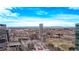 Expansive city view showing Denver's urban landscape and distant mountains offering stunning scenery at 1700 Bassett St # 820, Denver, CO 80202