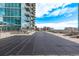 Upscale building with community pool surrounded by lounge chairs and a sundeck at 1700 Bassett St # 820, Denver, CO 80202