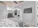 Comfortable main bedroom with a modern decor and view to the vanity area, providing a relaxing retreat at 1700 Bassett St # 820, Denver, CO 80202