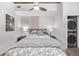 Well-lit main bedroom featuring a comfortable bed and convenient in-unit stackable washer and dryer at 1700 Bassett St # 820, Denver, CO 80202