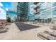 Rooftop pool and lounge area of a contemporary condo building, perfect for relaxation at 1700 Bassett St # 820, Denver, CO 80202