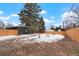 This backyard is fully fenced and provides privacy and an area for recreation at 6087 S Elizabeth Way, Centennial, CO 80121