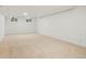 Large carpeted basement with white walls and windows for natural light at 6087 S Elizabeth Way, Centennial, CO 80121