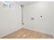 This finished basement room has vinyl floors, utility connections, and a bright window at 6087 S Elizabeth Way, Centennial, CO 80121