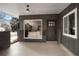 Inviting entrance with modern accents, gray brickwork and neutral tones at 6087 S Elizabeth Way, Centennial, CO 80121