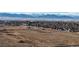 Aerial view of undeveloped land and distant mountains at 8625 Clay St # 227, Westminster, CO 80031