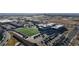 Aerial view of a school with playground and parking at 8625 Clay St # 227, Westminster, CO 80031