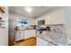 Modern kitchen with stainless steel appliances and granite countertops at 8625 Clay St # 227, Westminster, CO 80031