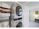 Stackable washer and dryer in laundry closet at 8625 Clay St # 227, Westminster, CO 80031