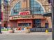 AMC Dine-In Theater, featuring modern architecture, outdoor seating, and well-maintained landscaping at 27234 E Quarto Ave, Aurora, CO 80016