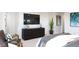 Stylish main bedroom featuring modern decor, a sitting area, and a walk in shower at 3877 Bahn Ct, Evergreen, CO 80439
