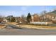 A street view showcasing the entrance sign for 'The Villas at Aspen Ridge' with landscaping at 18989 E Warren Dr # G303, Aurora, CO 80013