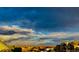 Scenic view of a neighborhood under a bright sky and fluffy clouds at 18989 E Warren Dr # G303, Aurora, CO 80013