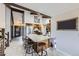 This open kitchen features granite countertops, stainless appliances, and lots of cabinet space at 10397 Yates Ct, Westminster, CO 80031