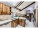 Bright, modern kitchen with granite countertops, stainless appliances, and hardwood floors at 10397 Yates Ct, Westminster, CO 80031