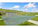 Outdoor basketball and multi-sport court with a scenic hillside backdrop, great for recreation at 19316 W 84Th Pl, Arvada, CO 80007