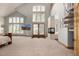 Bedroom with vaulted ceilings, fireplace, and large windows at 22554 Treetop Ln, Golden, CO 80401