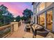Relaxing deck with outdoor seating, perfect for enjoying the views of the surrounding landscape at 22554 Treetop Ln, Golden, CO 80401
