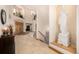 Grand foyer with high ceilings, tile flooring, and a striking sculpture at 22554 Treetop Ln, Golden, CO 80401