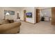 Cozy upstairs sitting room with comfortable seating and scenic views from the landing at 22554 Treetop Ln, Golden, CO 80401