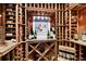 Charming wine cellar showcasing ample storage and stylish decor at 15 Amaranth Dr, Littleton, CO 80127