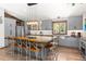 Bright kitchen features a large island, stainless steel appliances, and pendant lighting at 400 Upper Forest Rd, Idaho Springs, CO 80452