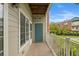 Private balcony offers a view of the community green space at 2705 S Danube Way # 103, Aurora, CO 80013