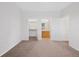 Bedroom leading to a closet and ensuite bath with double sinks at 2705 S Danube Way # 103, Aurora, CO 80013