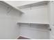 Walk-in closet featuring multiple shelves and plenty of room for storage at 2705 S Danube Way # 103, Aurora, CO 80013