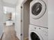 Conveniently located laundry closet with stacked washer and dryer units at 2705 S Danube Way # 103, Aurora, CO 80013