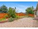 Landscaped backyard with paver patio and privacy fence at 4732 S Coolidge St, Aurora, CO 80016