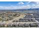 Expansive aerial view showcasing a neighborhood with access to trails and the Rolling Hills Golf Course at 15137 W 50Th Pl, Golden, CO 80403
