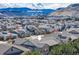 Home with mountain views, surrounded by neighborhood and mature trees at 15137 W 50Th Pl, Golden, CO 80403