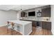Modern bar area featuring a white quartz counter, wood cabinetry, wine fridge, and stylish stools for entertaining at 15137 W 50Th Pl, Golden, CO 80403