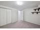 Bedroom featuring a closet, shelves, and light grey paint at 19322 E Eldorado Dr, Aurora, CO 80013