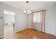 Dining Room with wood floors and a chandelier at 19322 E Eldorado Dr, Aurora, CO 80013