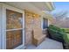 Front porch with a wooden bench for sitting at 19322 E Eldorado Dr, Aurora, CO 80013