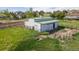 Well-maintained barn with stalls and storage, complemented by green pastures and ample space for livestock at 2464 Remington Rd, Elizabeth, CO 80107