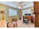 Cozy bedroom with natural light and office desk at 2464 Remington Rd, Elizabeth, CO 80107
