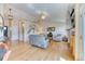 Comfortable living room with fireplace, hardwood floors and plenty of seating at 2464 Remington Rd, Elizabeth, CO 80107