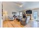 Spacious living room with hardwood floors, fireplace, and vaulted ceilings at 2464 Remington Rd, Elizabeth, CO 80107