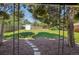 Large backyard featuring a covered patio area, mature trees, a storage shed and room for outdoor enjoyment at 1431 S Glencoe St, Denver, CO 80222