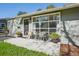 Inviting front porch with seating and stylish decor, framed by the beautiful home exterior at 1431 S Glencoe St, Denver, CO 80222