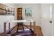 Home office with a modern desk, shelving, and natural light perfect for productivity at 1431 S Glencoe St, Denver, CO 80222