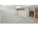 Spacious basement with carpet and stairway at 1582 Steele St, Denver, CO 80206