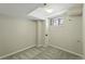 Finished basement with a small window at 1582 Steele St, Denver, CO 80206