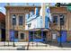 Classic theater with a vintage-style marquee, decorative lamps, and vibrant blue accents on the facade at 1582 Steele St, Denver, CO 80206